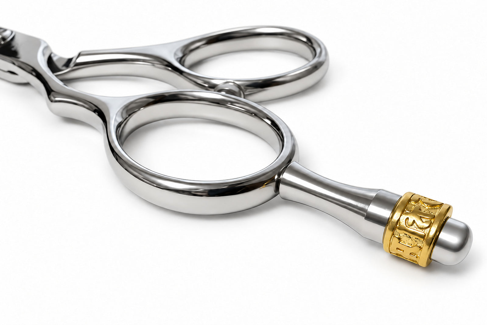 Gold-tone crown finger rest from the Ichiro Crown lefty cutting and thinning set